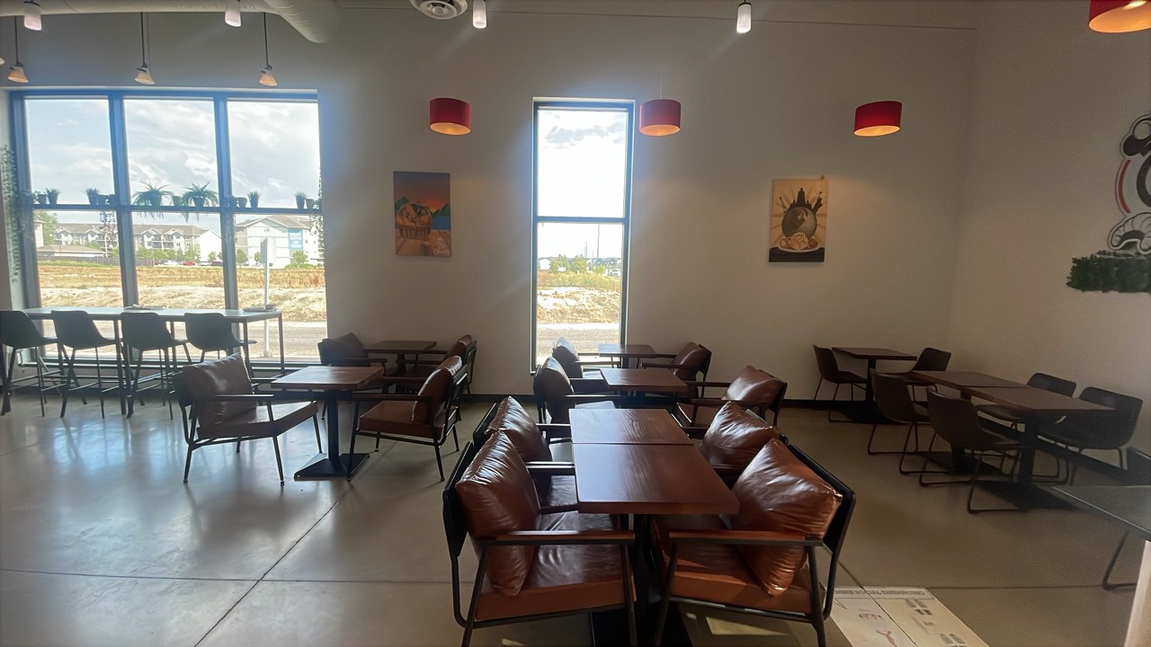Seating area inside Charito Bakery & Pastry in Canada